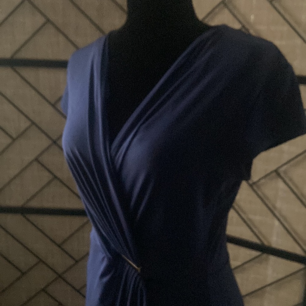 NEVER Worn! The color is Navy, aI am selling a red dress just like this one too.